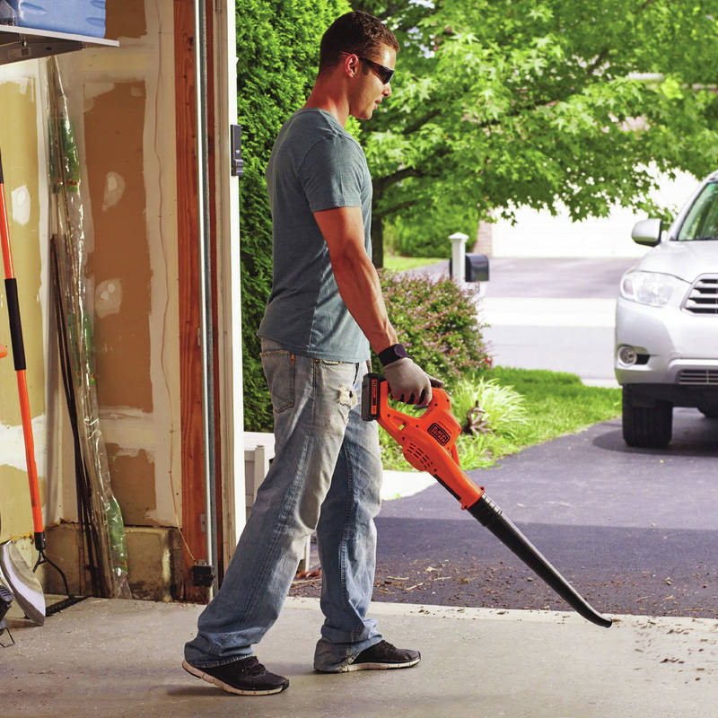 20V MAX 1.5 Ah Cordless Lithium-Ion Sweeper easily clears debris from hard surfaces like driveways, decks, and garages
